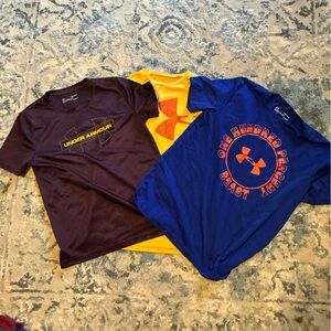 Under Armour Trio: Blue, Yellow, and Dark Purple Tees